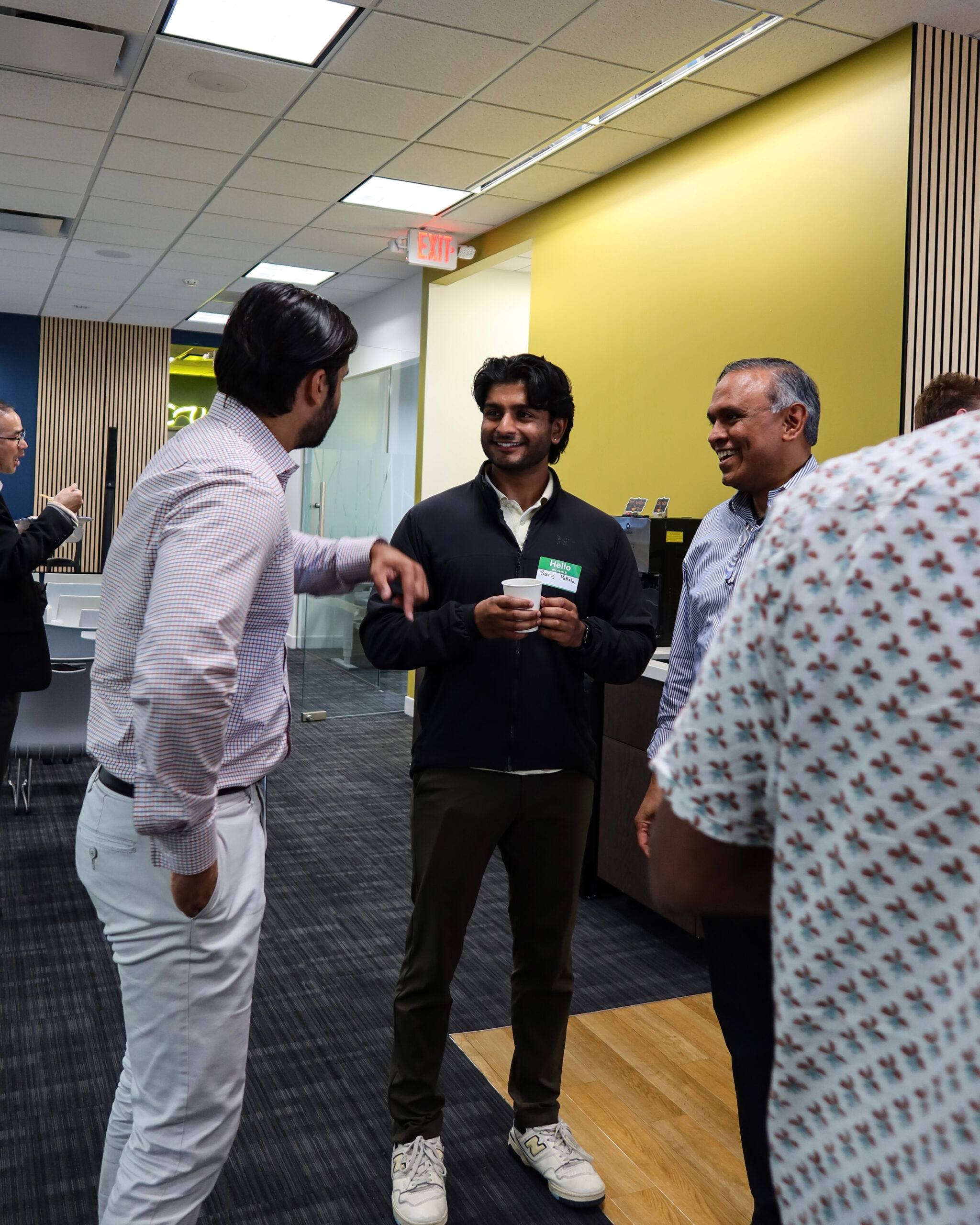 Founders mid-conversation at Venture Dock